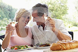 Couple Eating An Al Fresco Meal