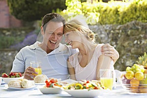 Couple Eating An Al Fresco Meal photo