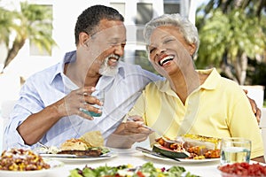 Couple Eating An Al Fresco Meal photo