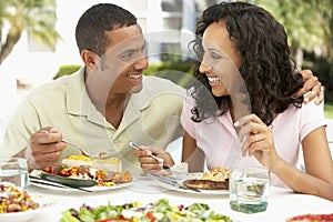 Couple Eating An Al Fresco Meal