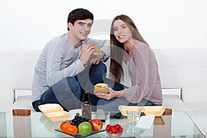 Couple eating fast food