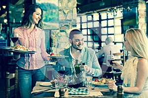 Couple eating out in restaurant