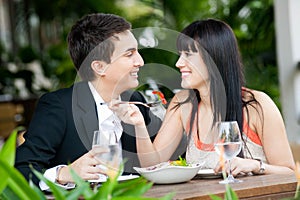 Couple Eating Outdoors photo