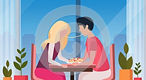 Couple eating spaghetti together happy valentines day holiday dinner concept man woman enjoying food modern restaurant