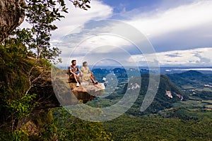 Couple at the edge of a mountain, Dragon Crest mountain Krabi Thailand