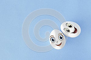 Couple eggs with happy face for love concept,