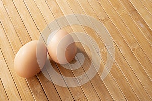 Couple eggs on wooden background