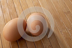 Couple eggs on wooden background