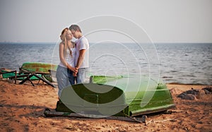 Couple embrace on a beach