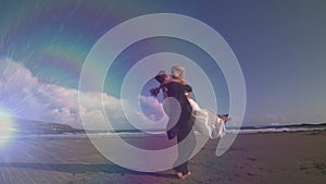 Couple embracing each other on the beach