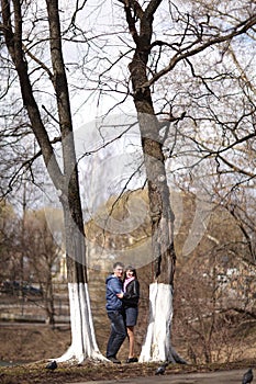 Couple embracing in the park