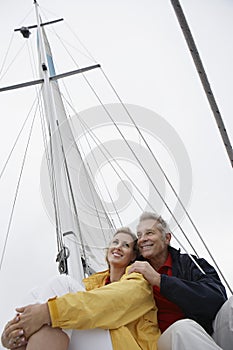 Couple Embracing On Sailboat