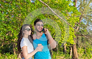 Couple Embracing Tropical Green Forest Summer Vacation, Beautiful Young People In Love, Man Woman Happy Smile