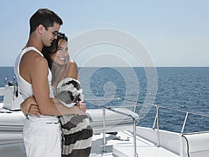 Couple Embracing On Yacht