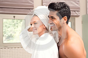 Couple embrassing after shower, Attractive couple after Morning Shower photo