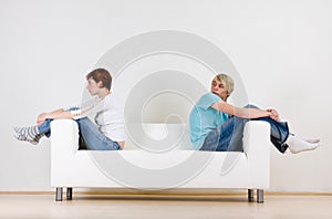 Couple on ends of couch