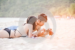 Couple enjoy and happy fun on beach laughing