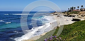 Beach time in the sun and sand on the Pacific Ocean - La Jolla, California