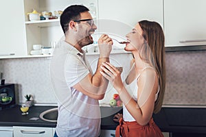 Couple enjoying breakfast time together at home