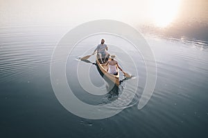 Couple enjoying a canoe ride on the lake