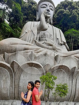 Couple enjoying at The Chin Swee Caves Temple which is a Taoist temple in Genting Highlands, Pahang, Malaysia, scenery from a top