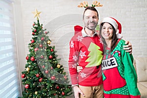 Couple Enjoying Christmas Celebrations At Home