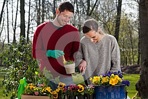 Couple enjoying garden work