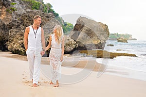 Couple enjoying honeymoon on tropical beach