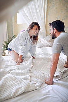 Couple  enjoying intimate moment at morning in bed