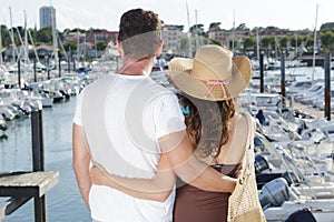 Couple enjoying relaxing summer day in port