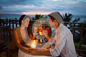 Couple enjoying a romantic dinner by candlelight