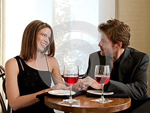 Couple Enjoying Selves at Restaurant