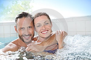 Couple enjoying in spa center