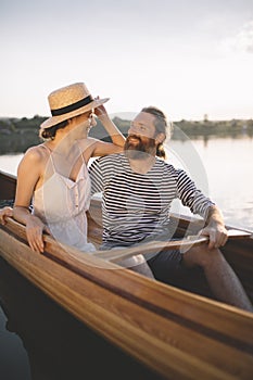 Couple enjoying a summer canoe ride