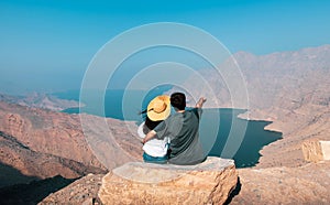 Couple enjoying view of Fjord Khor Najd in Musandam Oman