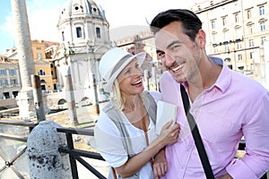 Couple enjoying of visit in Foro Traiano