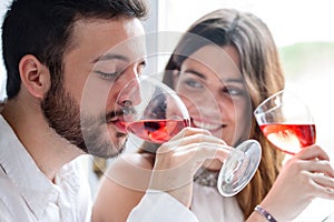 Couple enjoying wine tasting.