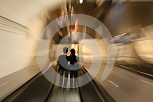 Couple on Escalator photo