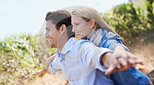 Couple, face and happy in nature with freedom in relationship for holiday, vacation or travel. Romance, man and woman