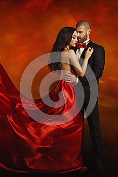 Couple Fashion Portrait, Elegant Man and Woman in Red Dress