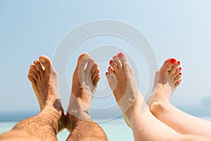 Couple of feet on beach