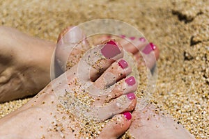 Couple feet on the beach, love tenderness connection concept