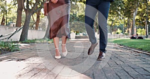 Couple, feet and walking to date, road and nature in park, elegant and closeup up on legs and shoes. Outdoor, person and