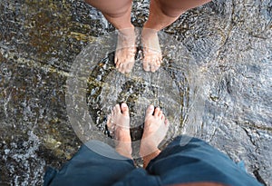 Couple feet in water, refreshing in the waterfall