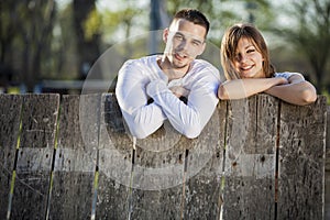 Couple by the fence