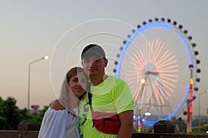 Couple on a ferris wheel background photo