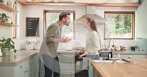 Couple, fight and angry in home for problem, breakup and toxic marriage in kitchen. Divorce, argument and frustrated man