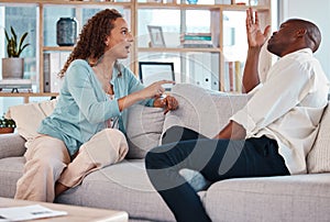 Couple, fight and argue on sofa for marriage problems, breakup or bad communication in lounge. Divorce, crisis and