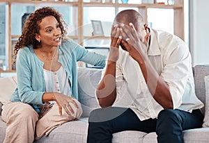 Couple, fight and depression on sofa of marriage problems, breakup or bad communication in lounge. Divorce, crisis and