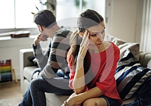 Couple fighting with depressed face expression photo